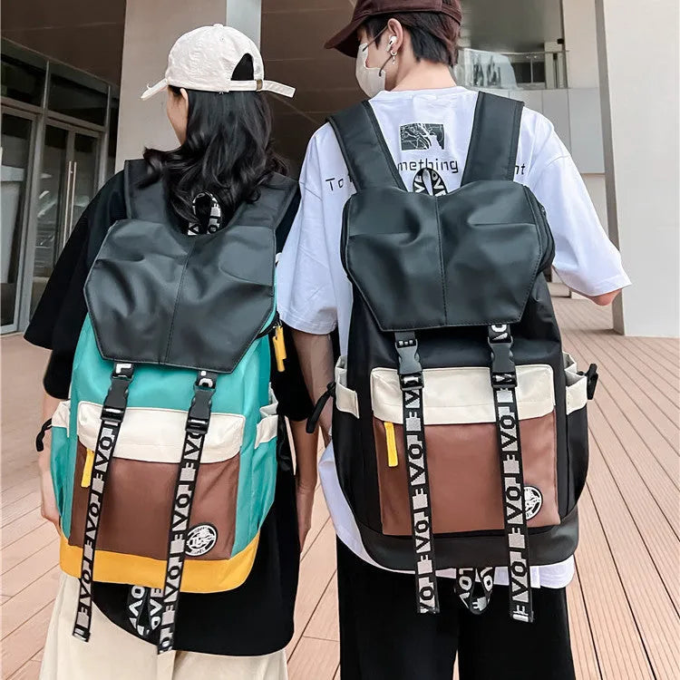 Oxford cloth student backpack showing three carrying methods in black, green and red colour options