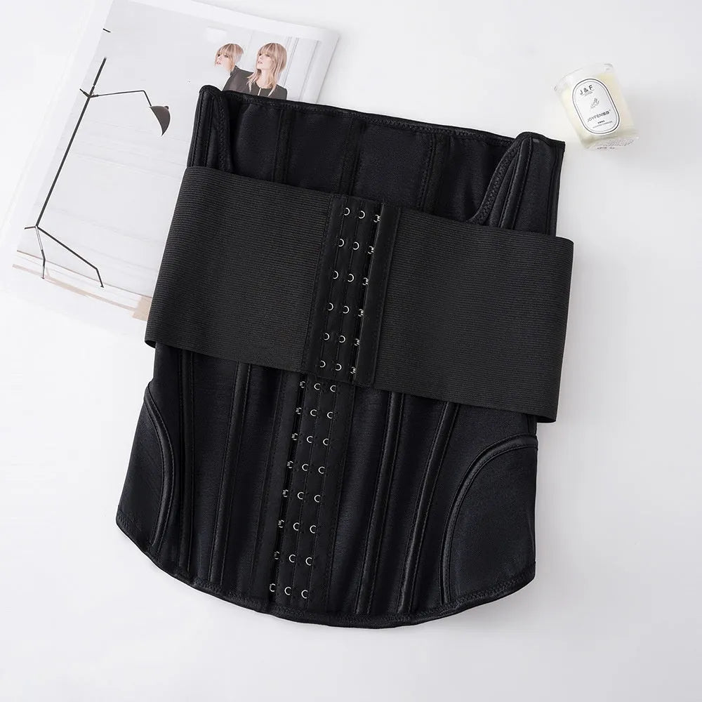 Nylon belly band waist trainer in black, showing adjustable belt tie fastener.
