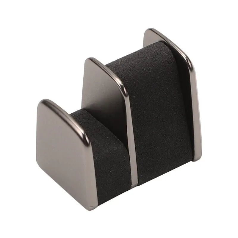 Green zinc alloy and leather glasses clip holder for car dashboard.