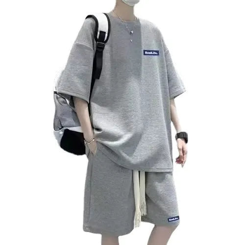 Waffle texture leisure sports suit set consisting of a short sleeve top and shorts, shown in a classic colour.