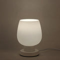 Nordic glass touch dimming bedside night light with three colour settings and USB port, white glass on dark surface