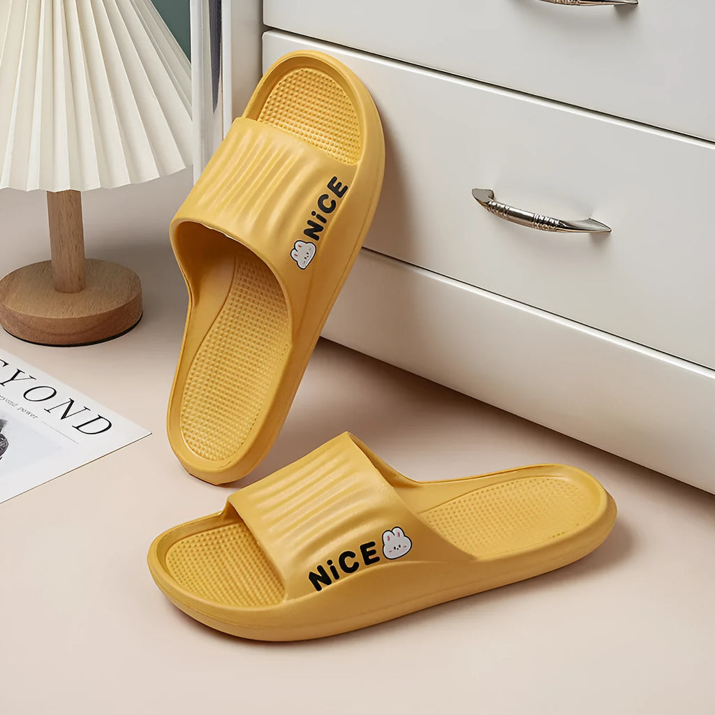 EVA injection moulded cartoon pattern slippers in dark blue with non-slip sole, available in sizes 36-45