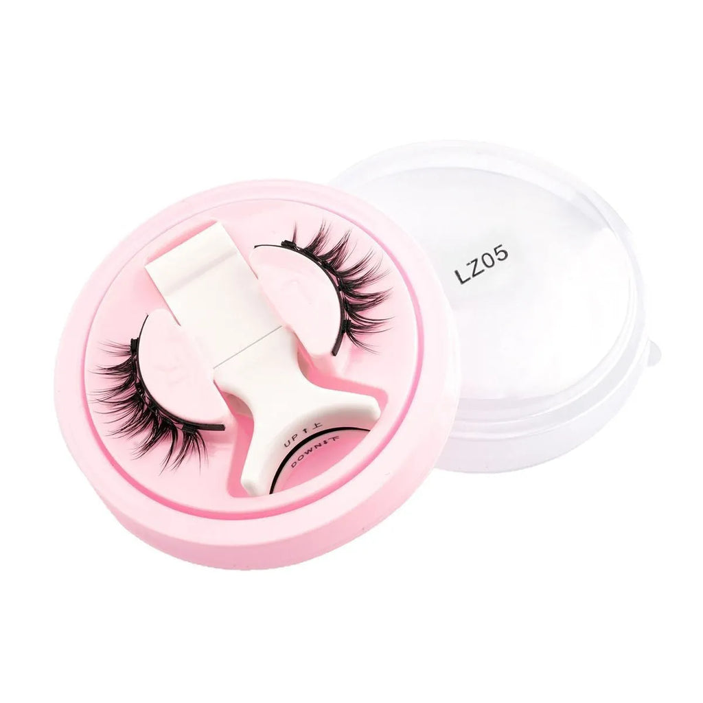 Set of reusable waterproof false eyelashes in five styles on a clear tray