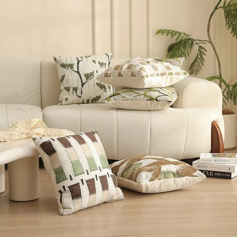 Square Jacquard floral cushion cover in a choice of colours, showing textured plants and flowers pattern.