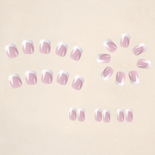 24 white plaid pattern fake nails arranged showing distinctive design