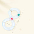 Blue and white plastic cat toy turntable track with a ball and a separate teasing stick.