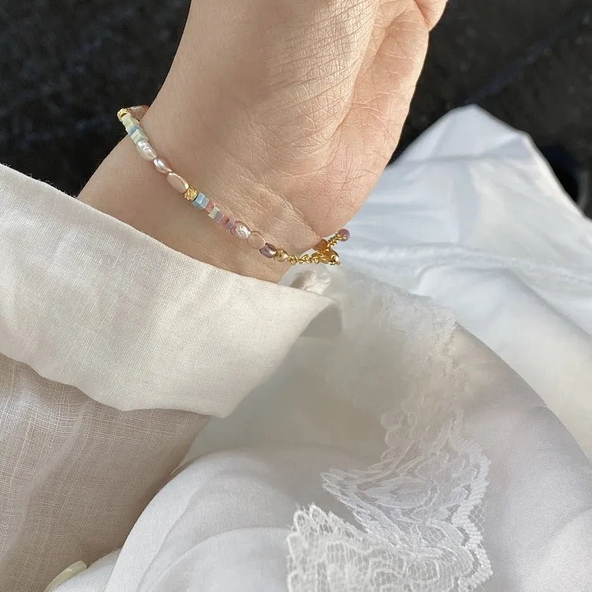 Handmade natural pearl bracelet and necklace set with 14K gilded purple silver accents and irregular pendant