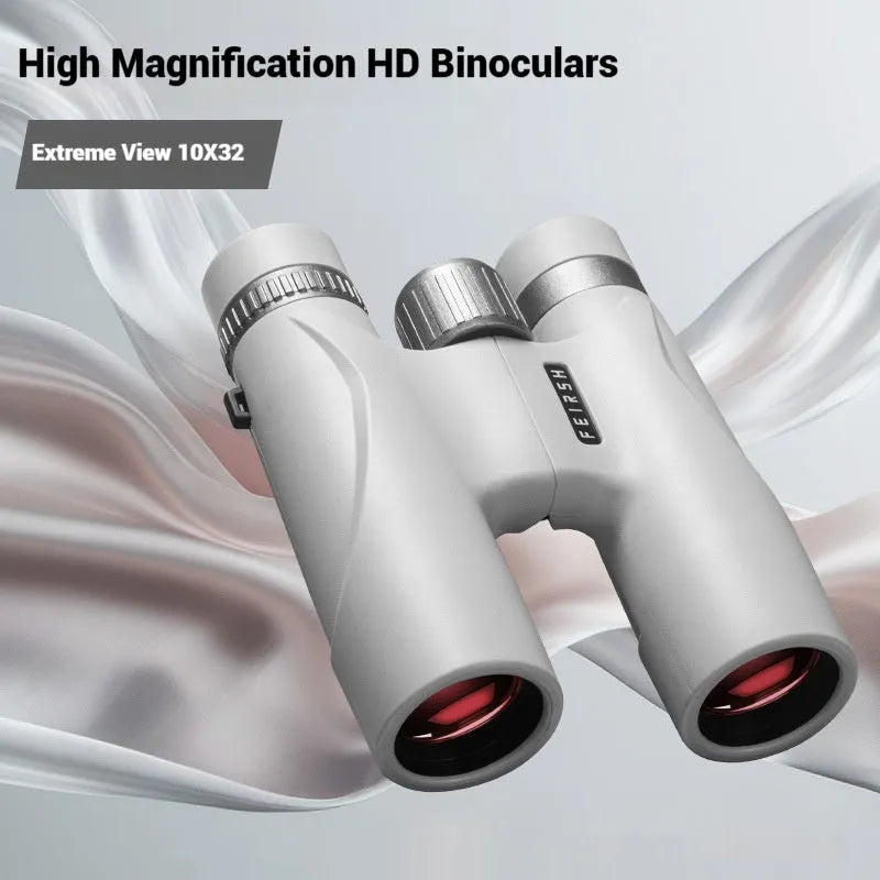 Close-up of grey 10x32 compact binoculars with wine red film lenses on a textured background.