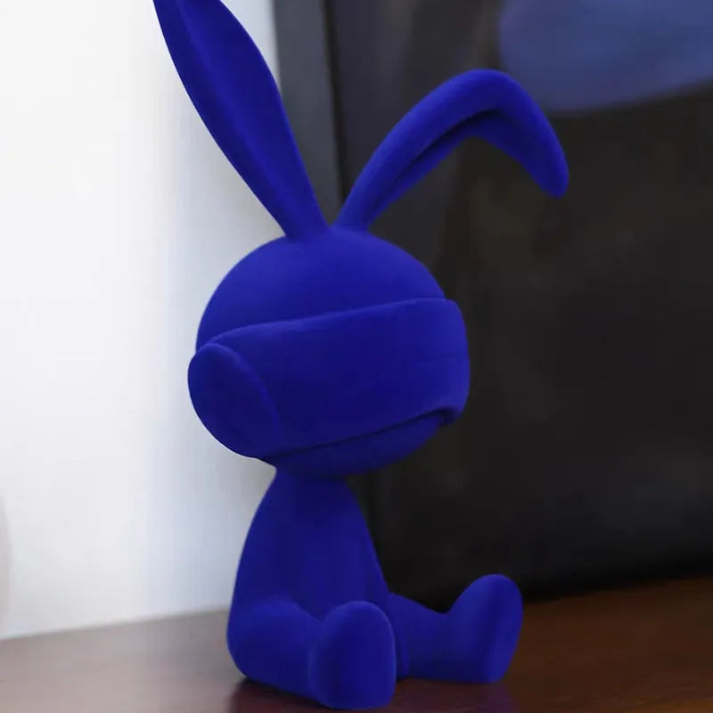 Resin suede blindfold rabbit table ornament in blue, green, and red colour options