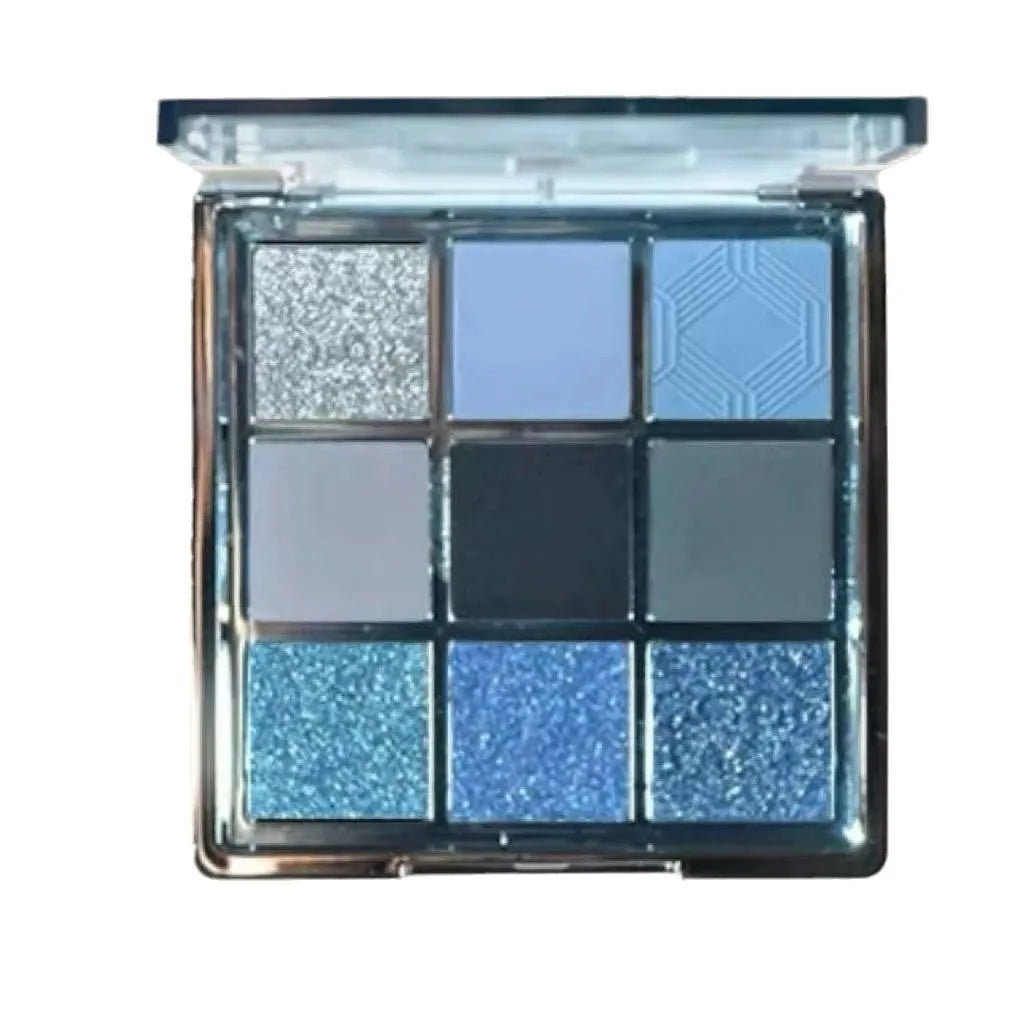MUGELEEN nine-colour eye shadow palette showing earth tones with blue smoked variations