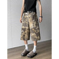 Yellow snake pattern camouflage jeans with cropped length and printed design