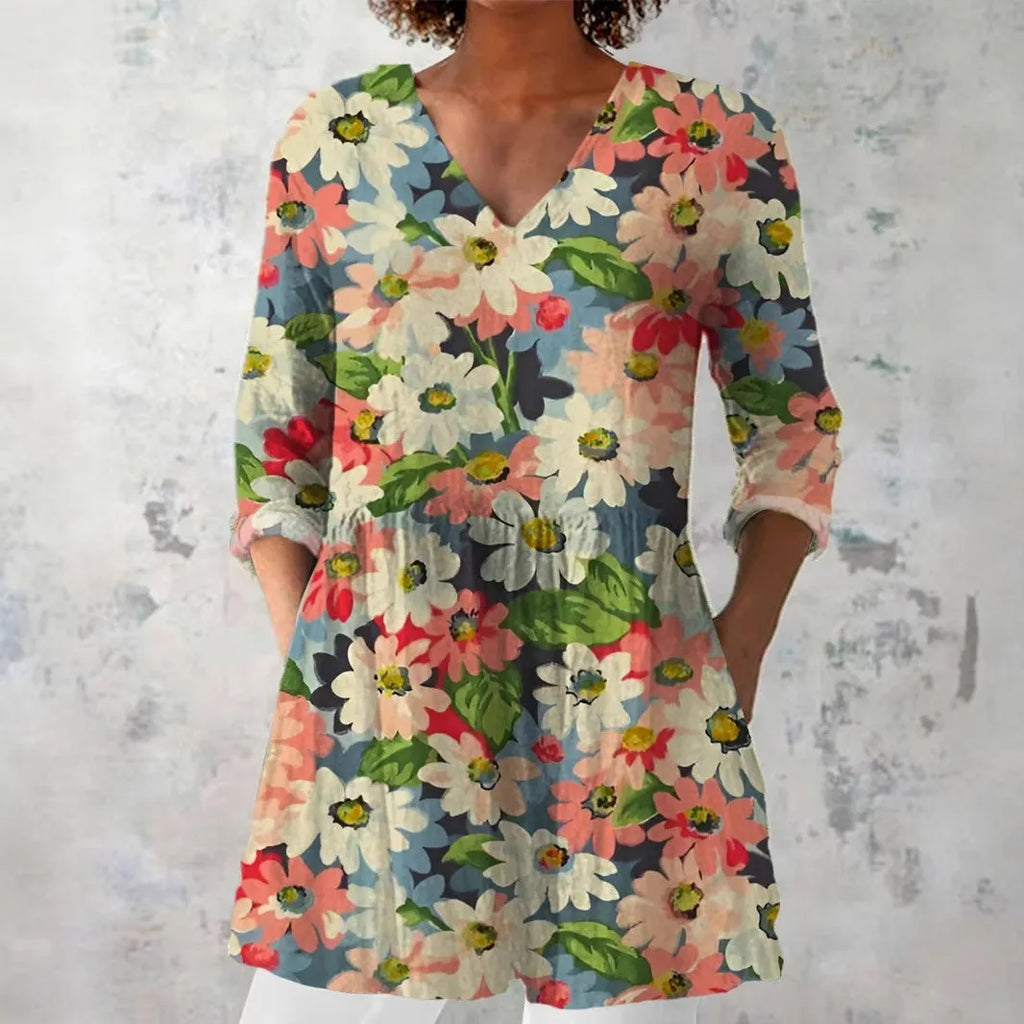 Women's retro-style slim fit long-sleeved top with a printed pattern, shown in one of twelve available colours.