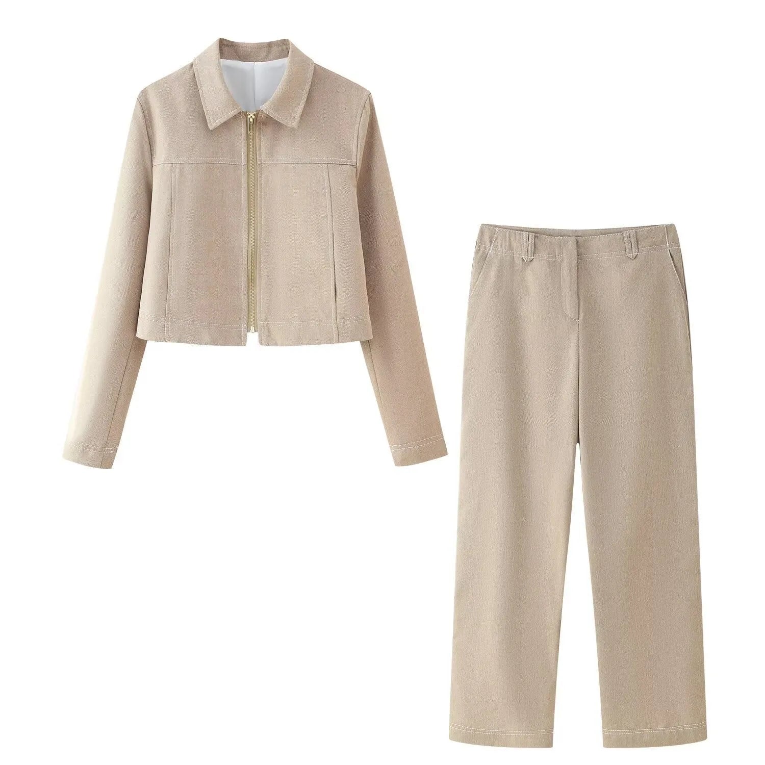Women's grey herringbone pattern suit with long sleeve coat and straight-leg trousers, showing embroidery detail.