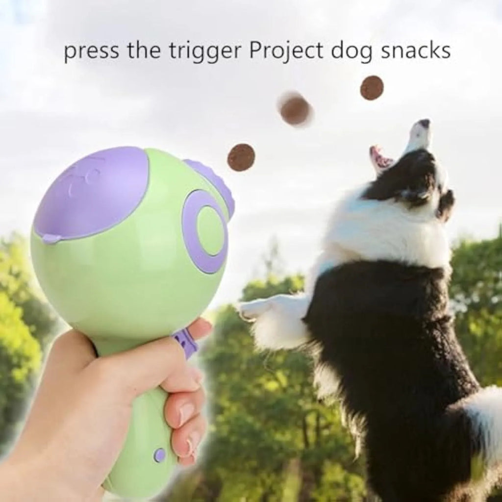 Green dog treat launcher toy measuring 15.5cm with anti-leak design for interactive play