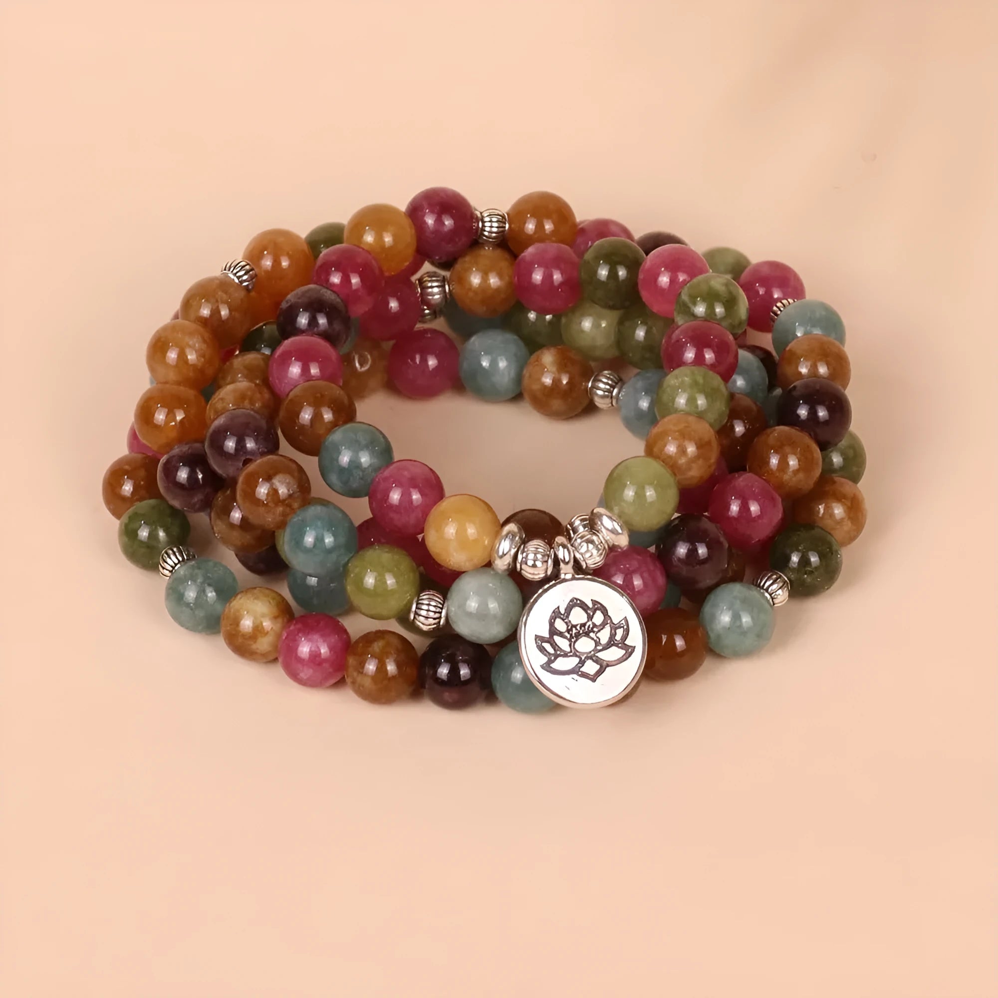 Multi-strand tourmaline bead bracelet with lotus clasp showing 108 beads on alloy chain
