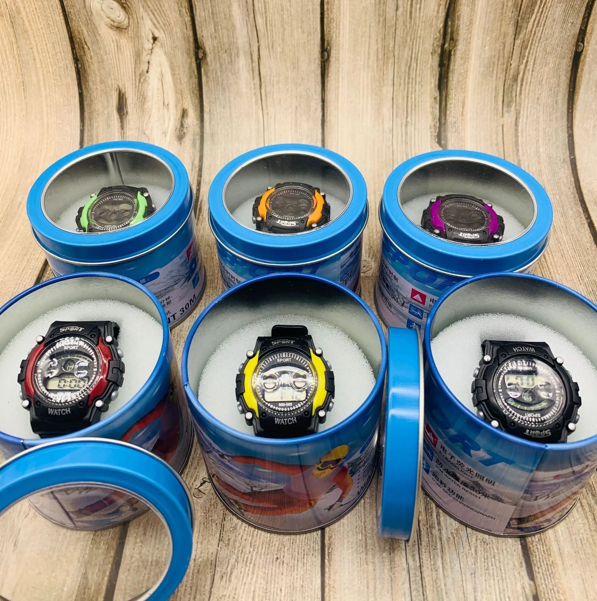 Children's digital sports watch with silicone strap, digital display showing time, alarm and calendar functions