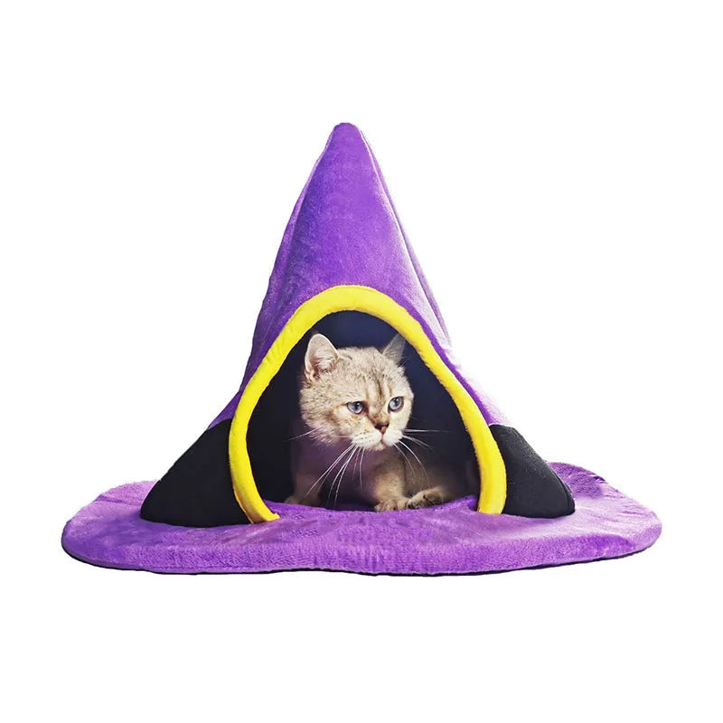 Purple cloth witch hat shaped cat bed for small cats, dimensions 60cm by 45cm.