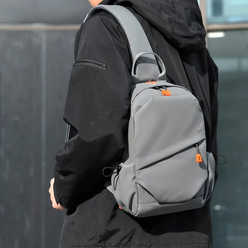 Men's black waterproof polyester crossbody bag with adjustable shoulder strap