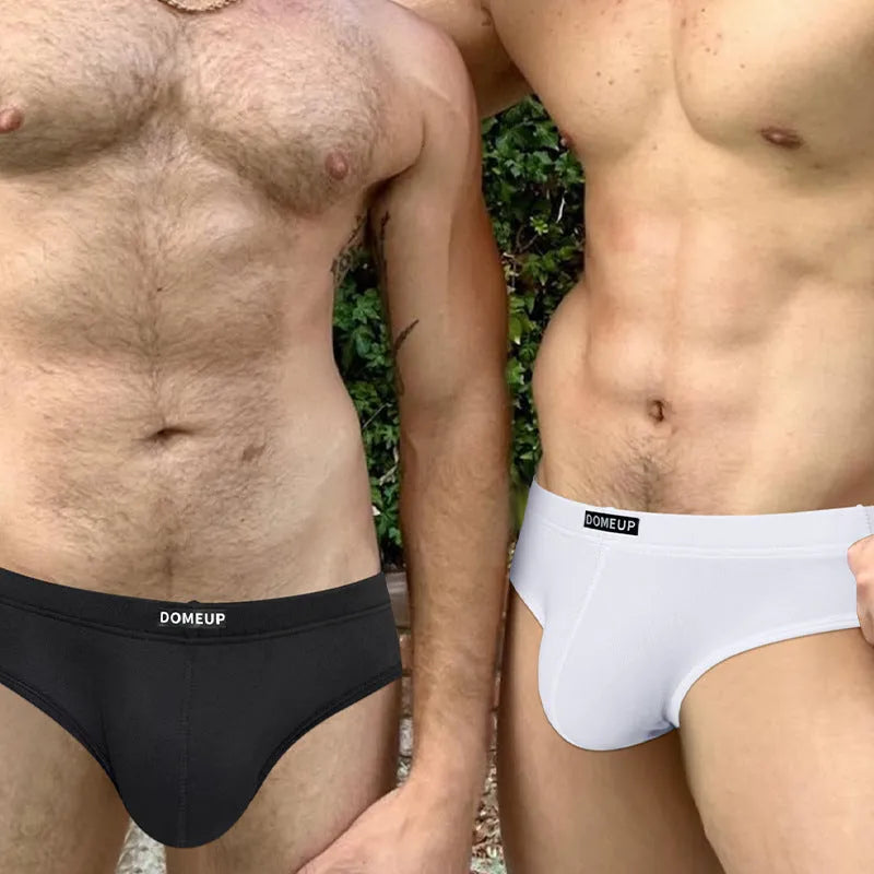 Men's solid colour low-waist polyester briefs on a white background