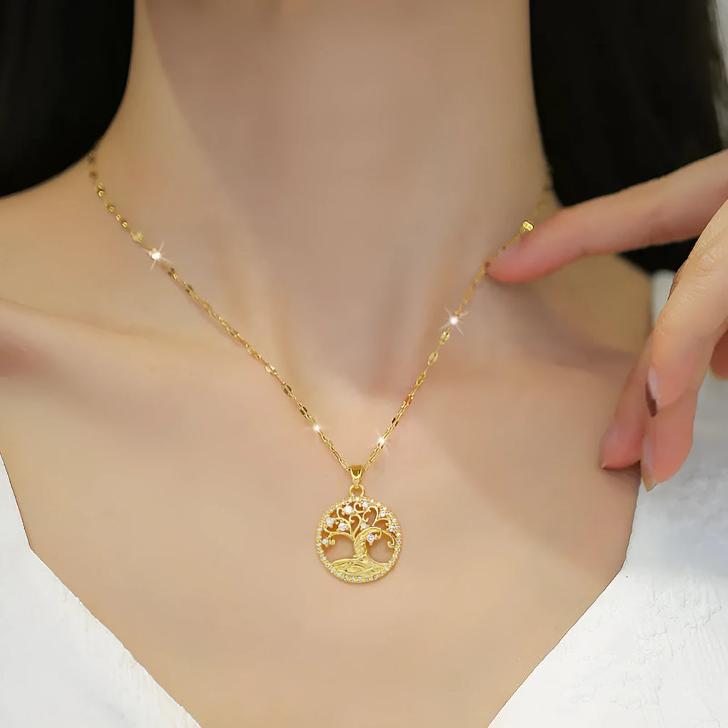 Gold-plated necklace with mother pearl pendant and rhinestone detailing on adjustable lip chain