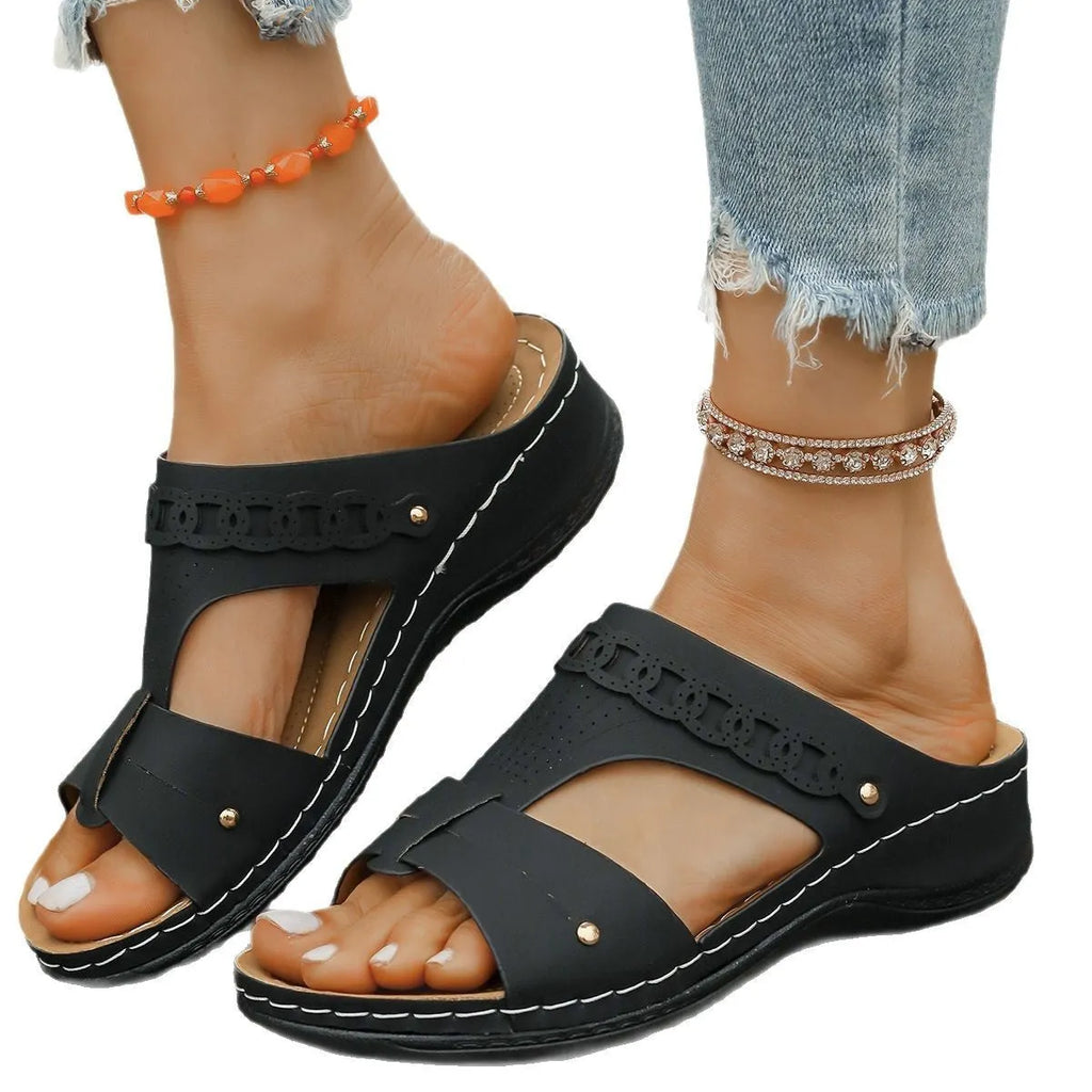 Roman style slippers with slope heel in six colour options showing fish mouth toe holder design