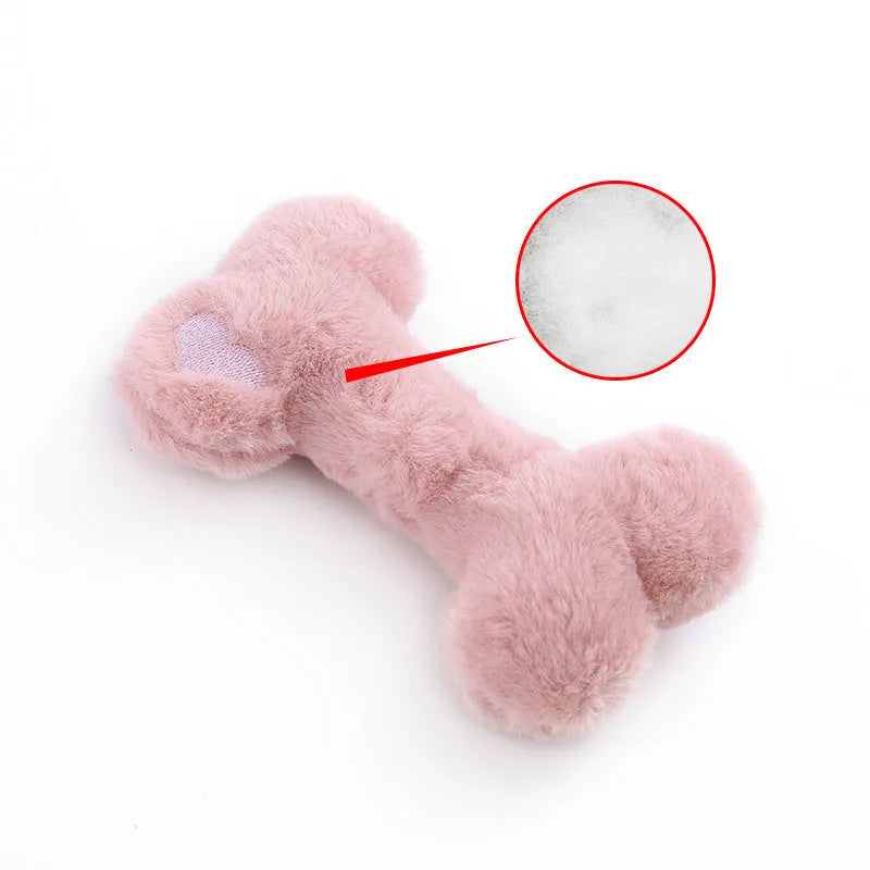 Blue plush love bone dog toy with squeaker for bite-resistant interactive play.