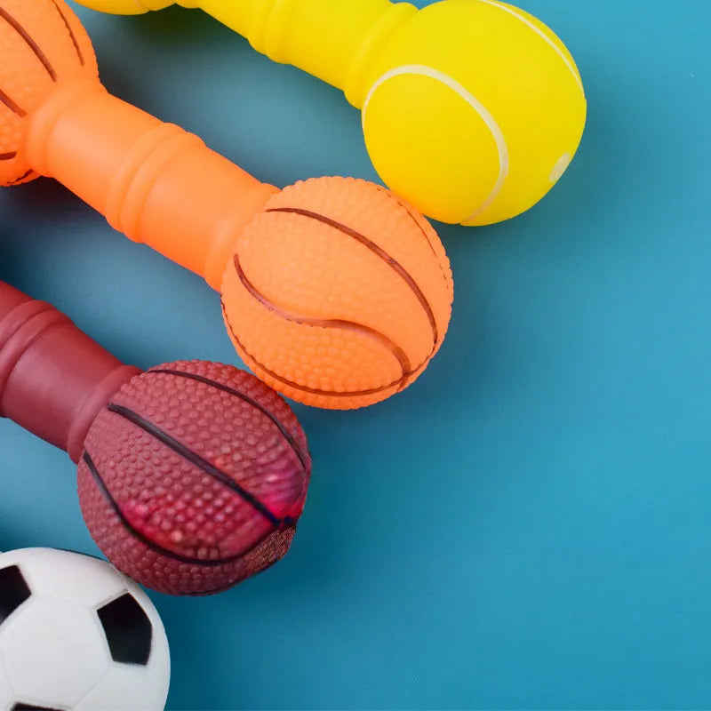 Brown, orange, white, and yellow PVC football dumbbell shaped dog toy with squeaker.