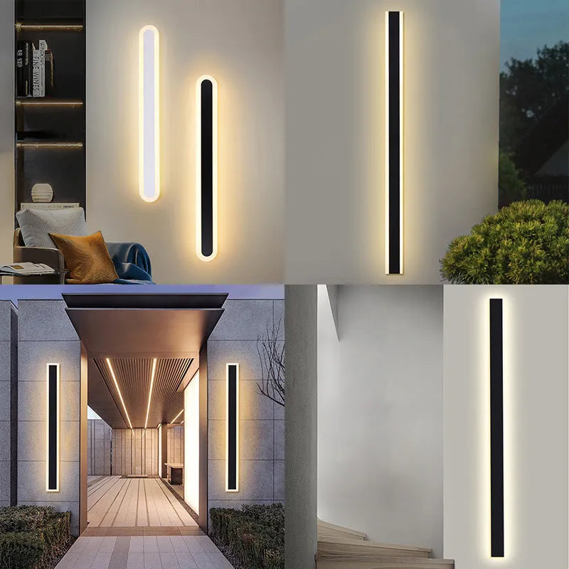 A long, straight outdoor LED wall lamp with a black wrought iron shell, mounted on a brick wall.