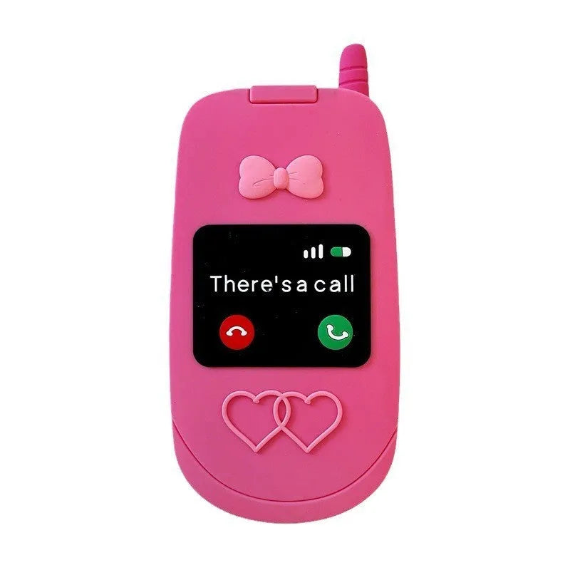 Light pink silicone flip phone shaped mirror case for iPhone on a white background.