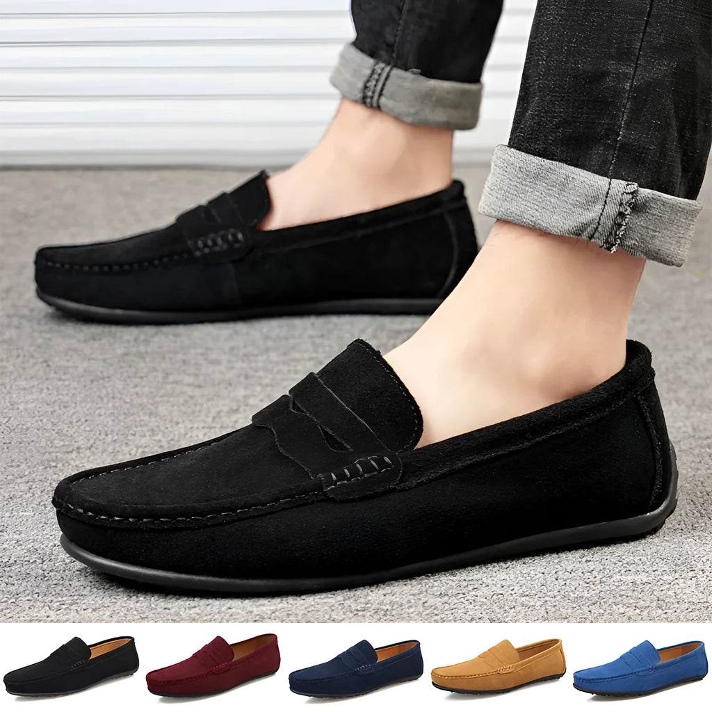 Men's solid-colour suede loafers with a round toe and flat rubber sole.