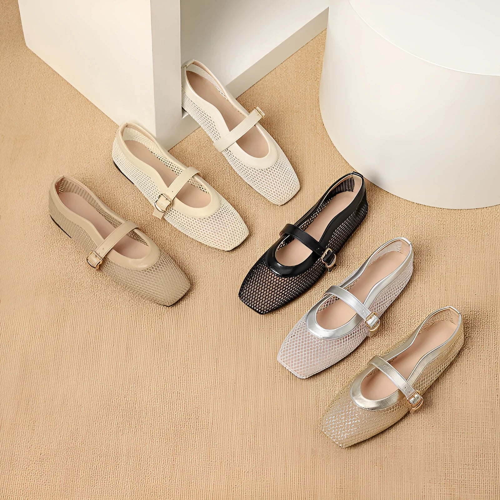 Women's beige mesh buckle pumps with a square toe and flat sole on a white background.