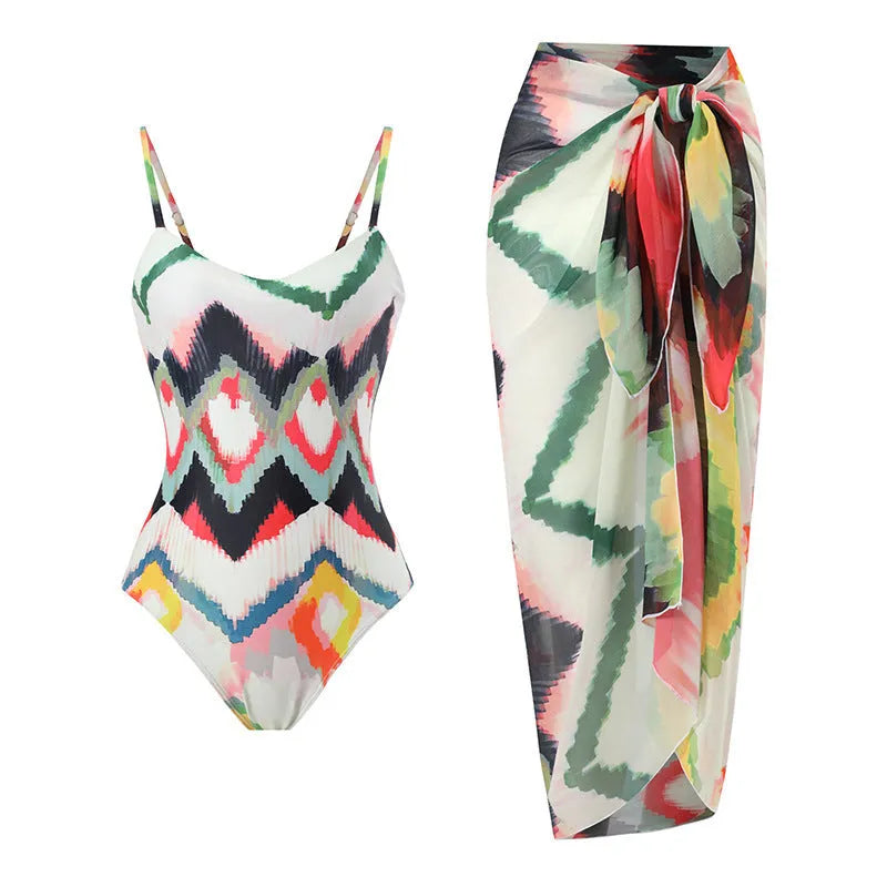 Women's striped two-piece swimsuit set with matching hip skirt on a mannequin.