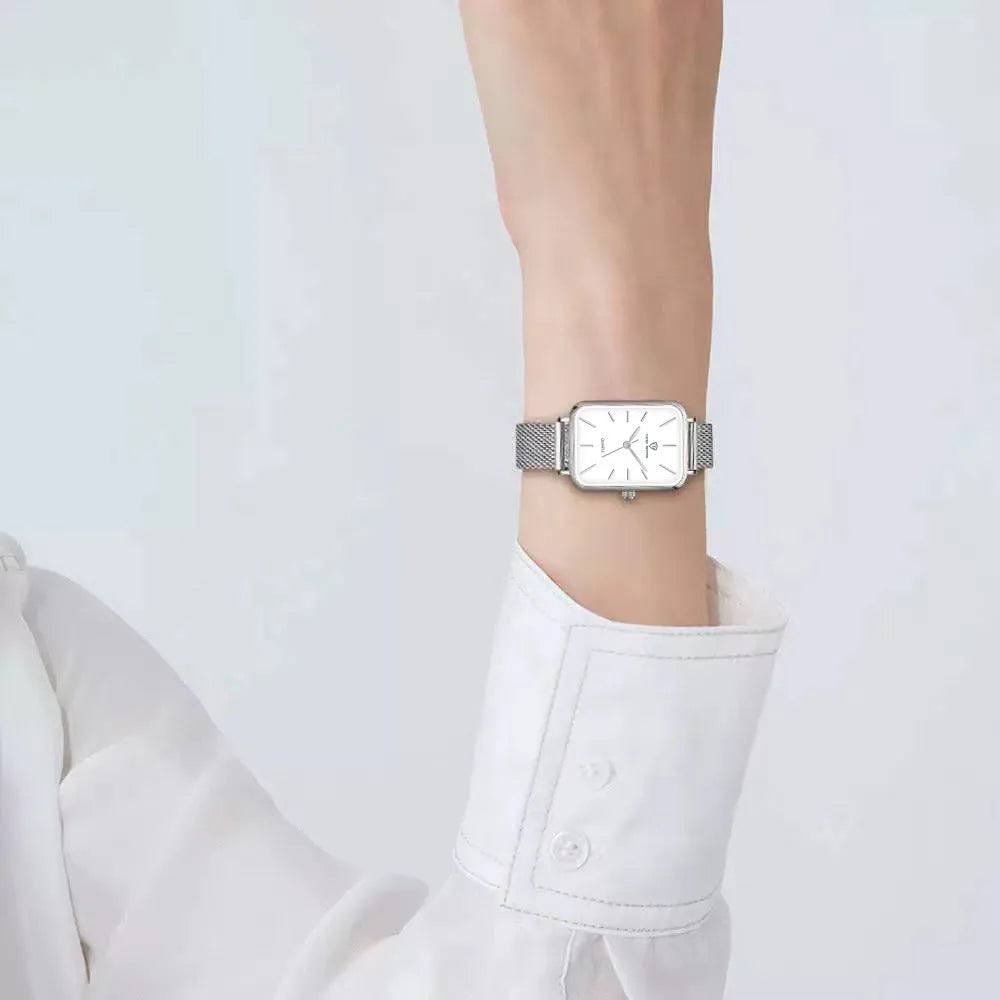 Women's waterproof quartz watch in rose gold or silver with woven steel strap and 34mm alloy case
