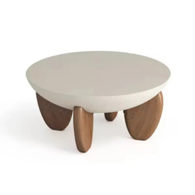 White adjustable height solid wood coffee table shown in a living room setting.