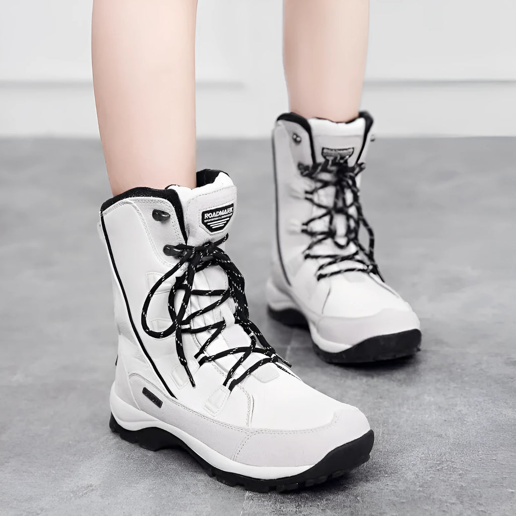 Women's black genuine leather mid-calf snow boots with round toe and rubber sole