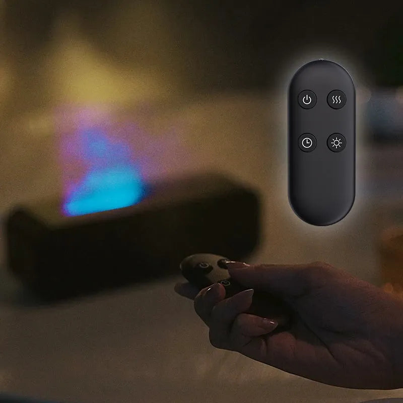 Black flame design aroma diffuser with remote control on a wooden table