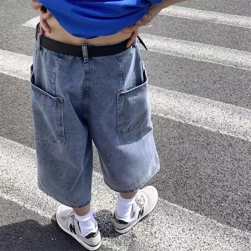 Blue men's high-waist washed denim pirate shorts with a cropped length and straight leg.