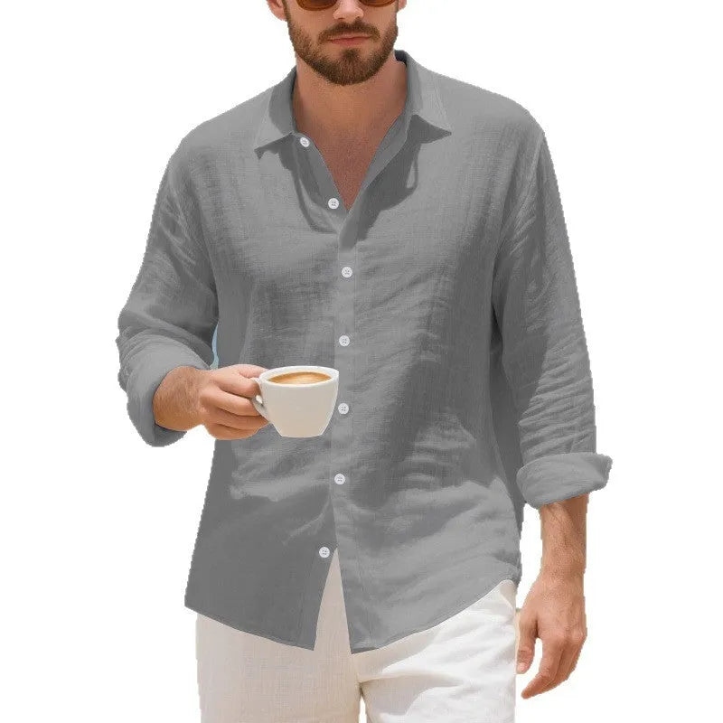 A loose-fit linen casual shirt in an earthy yellow colour, showing a non-iron texture and American-style collar.