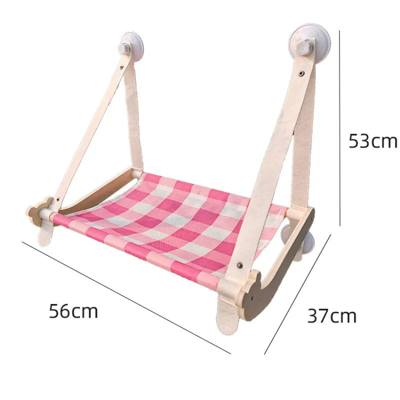 Cat window hammock with wooden frame and linen fabric, secured by four suction cups, in pink colour option
