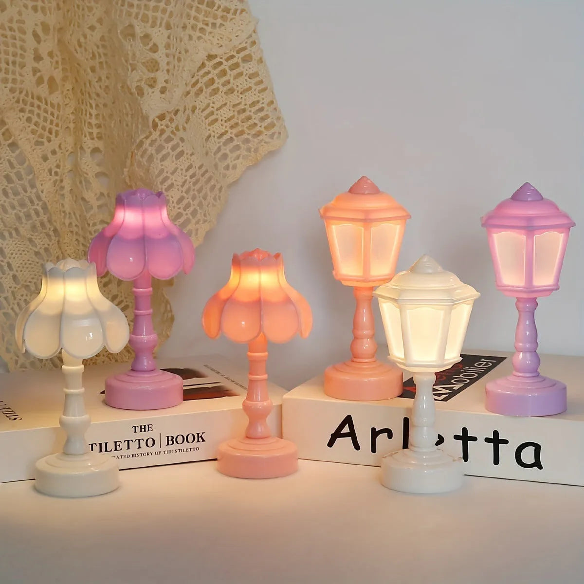 Retro pagoda-shaped small LED night lamp in light purple with geometric stereo design