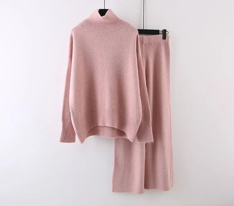 Women's casual two-piece set with long sleeve sweater and wide leg trousers in a solid colour.