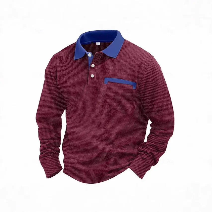 Man wearing a long-sleeved waffle-knit polo shirt in a solid colour with asymmetric detailing.