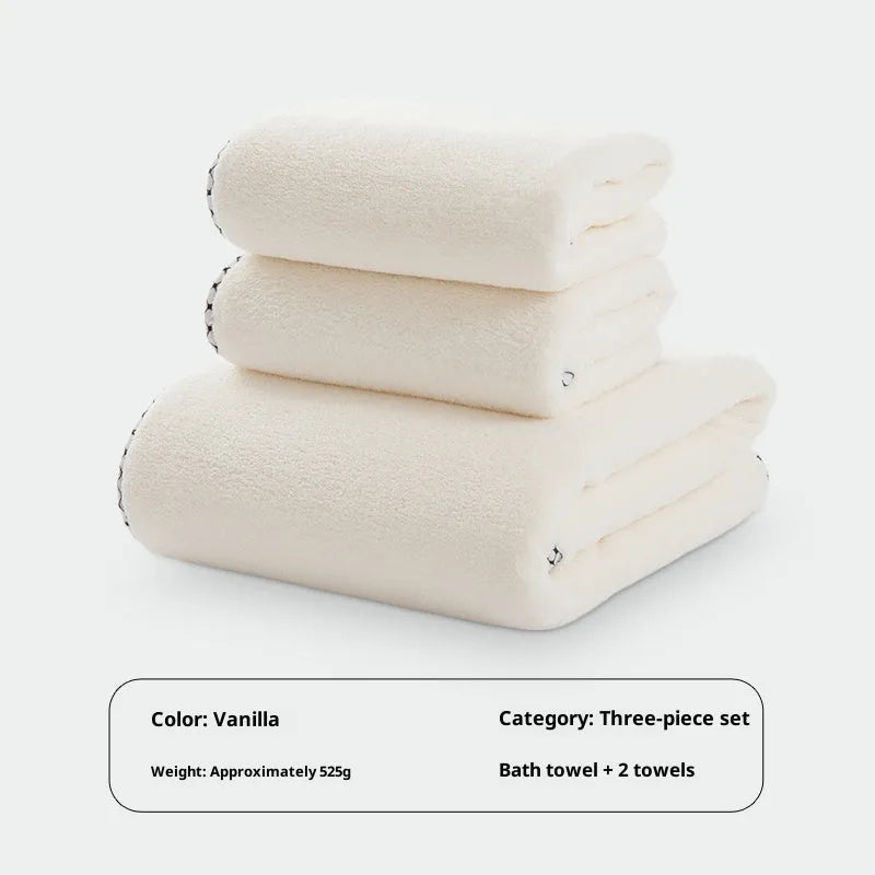 High density coral fleece three-piece towel set in solid vanilla colour with one bath towel and two hand towels