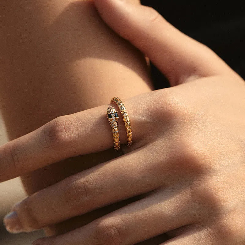 Snake-shaped adjustable finger ring with gold colour finish and detailed animal design