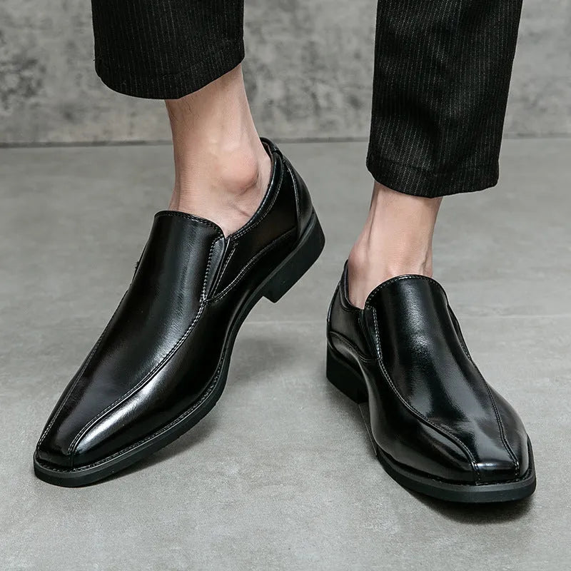 Men's black pointed patent leather shoes with leather lining and flat heel on a neutral background