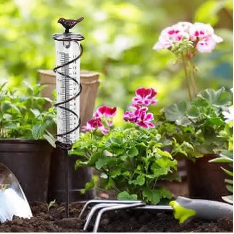 Cast iron outdoor rain gauge with glass tube showing 1-20 scale and 0-800ml capacity for garden lawn use