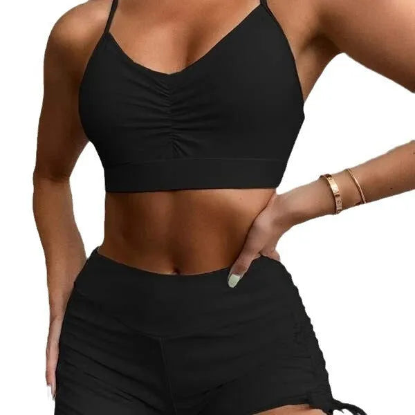 Women's black high waist split swimsuit bikini set with briefs shorts on a mannequin.