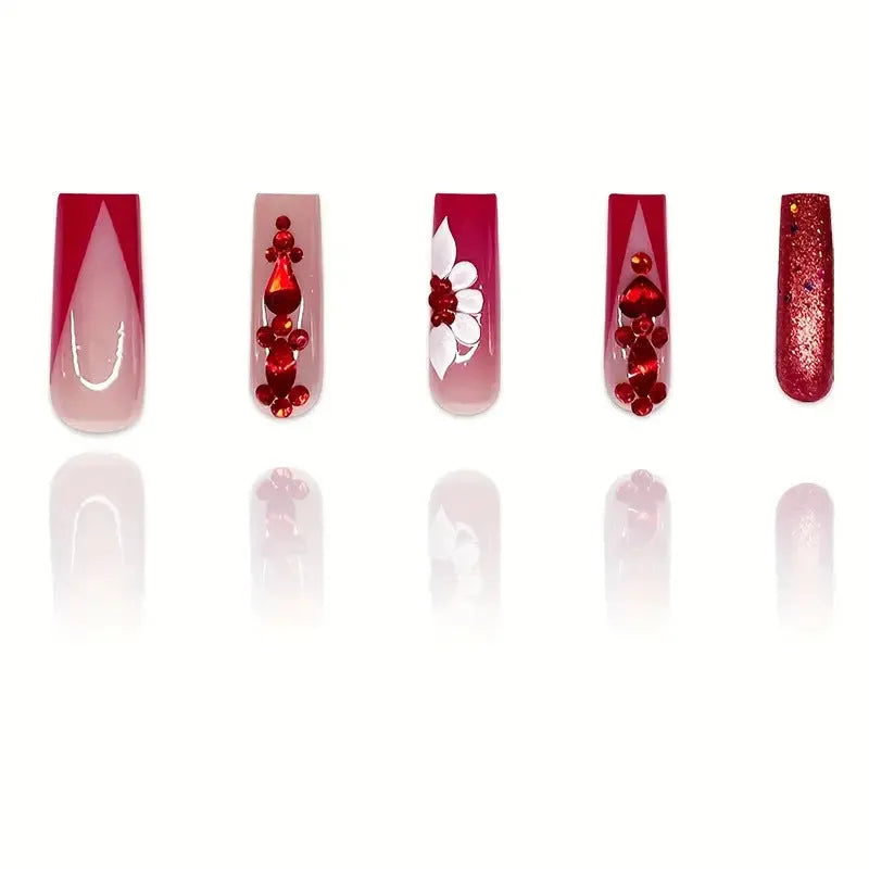 Press-on false nails with sweet floral patterns and red diamond accents in European Square long style