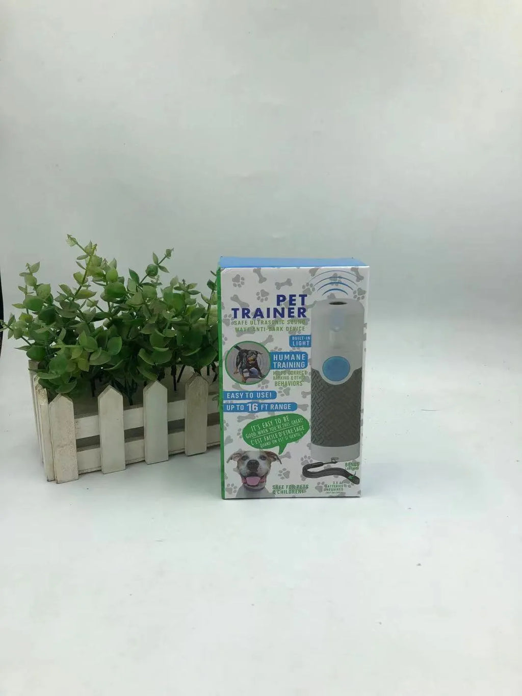 White handheld ultrasonic dog trainer device for bark control and behaviour correction