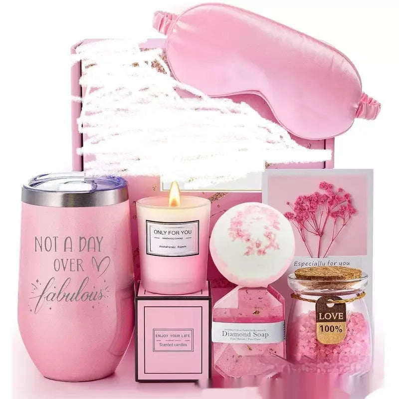 Boxed aromatherapy candle gift set with various modern soy wax designs including pink and sunflower themes.